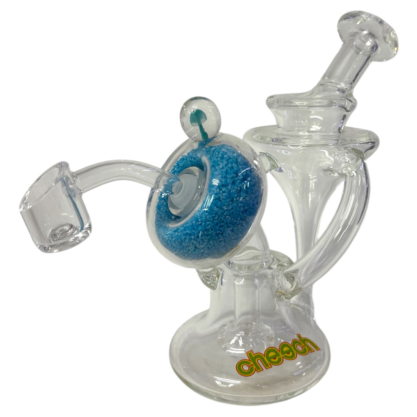 Clear glass smoking device with blue sand and 'cheech' branding on a white background