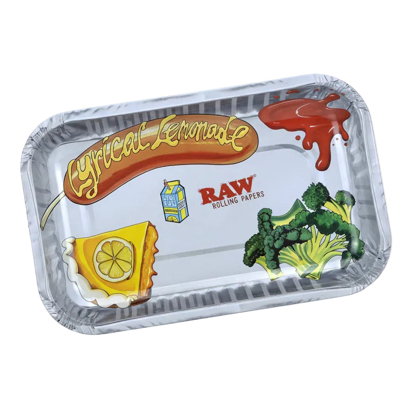 Metallic rolling tray with 'Lyrical Lemonade' and 'RAW Rolling Papers' branding, featuring illustrations of a lemon, broccoli, and a drink.
