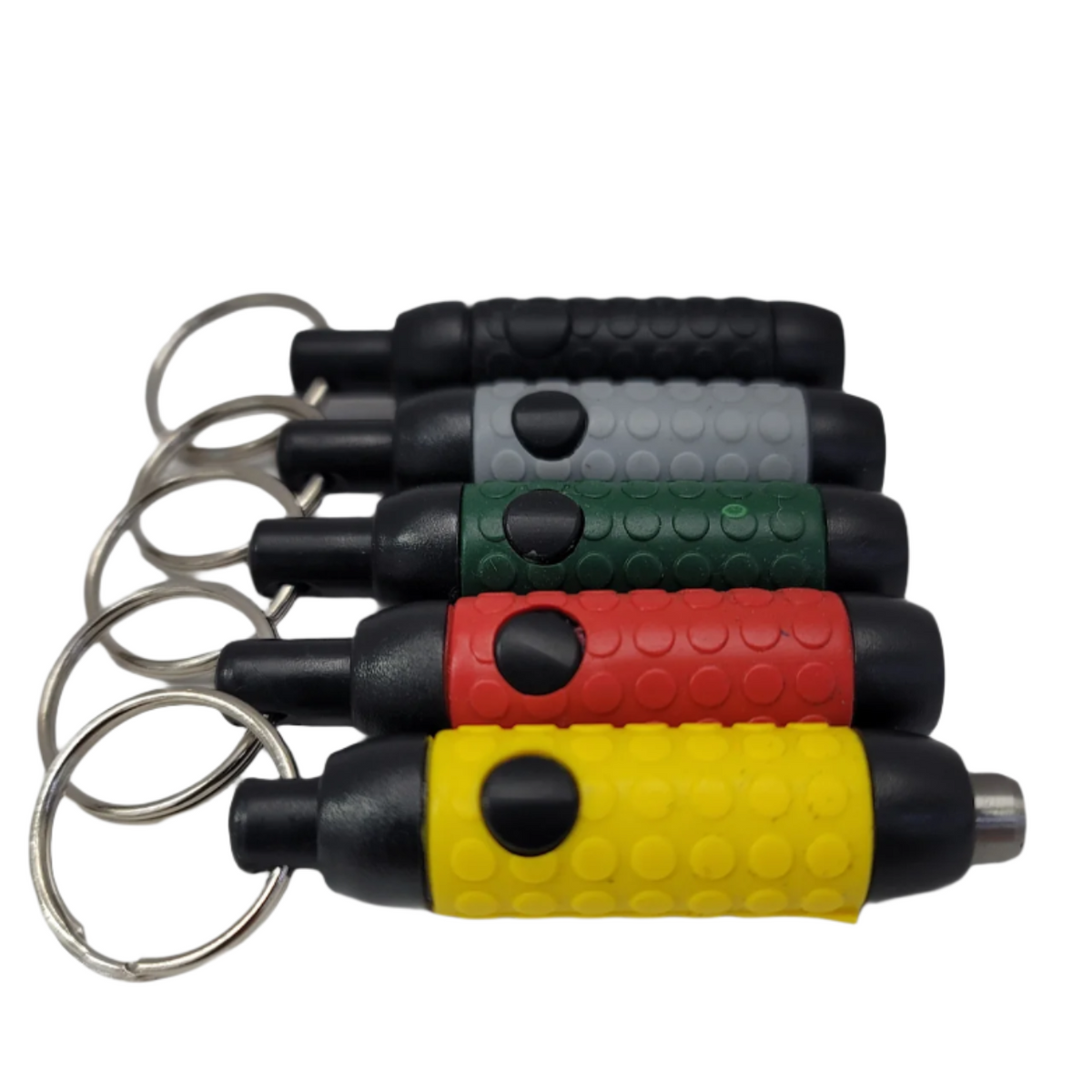 Assorted retractable keychain cigar punches shown in black, grey, green, red, and yellow, each with a textured grip, black push button, metal keyring, and retractable punch tip.