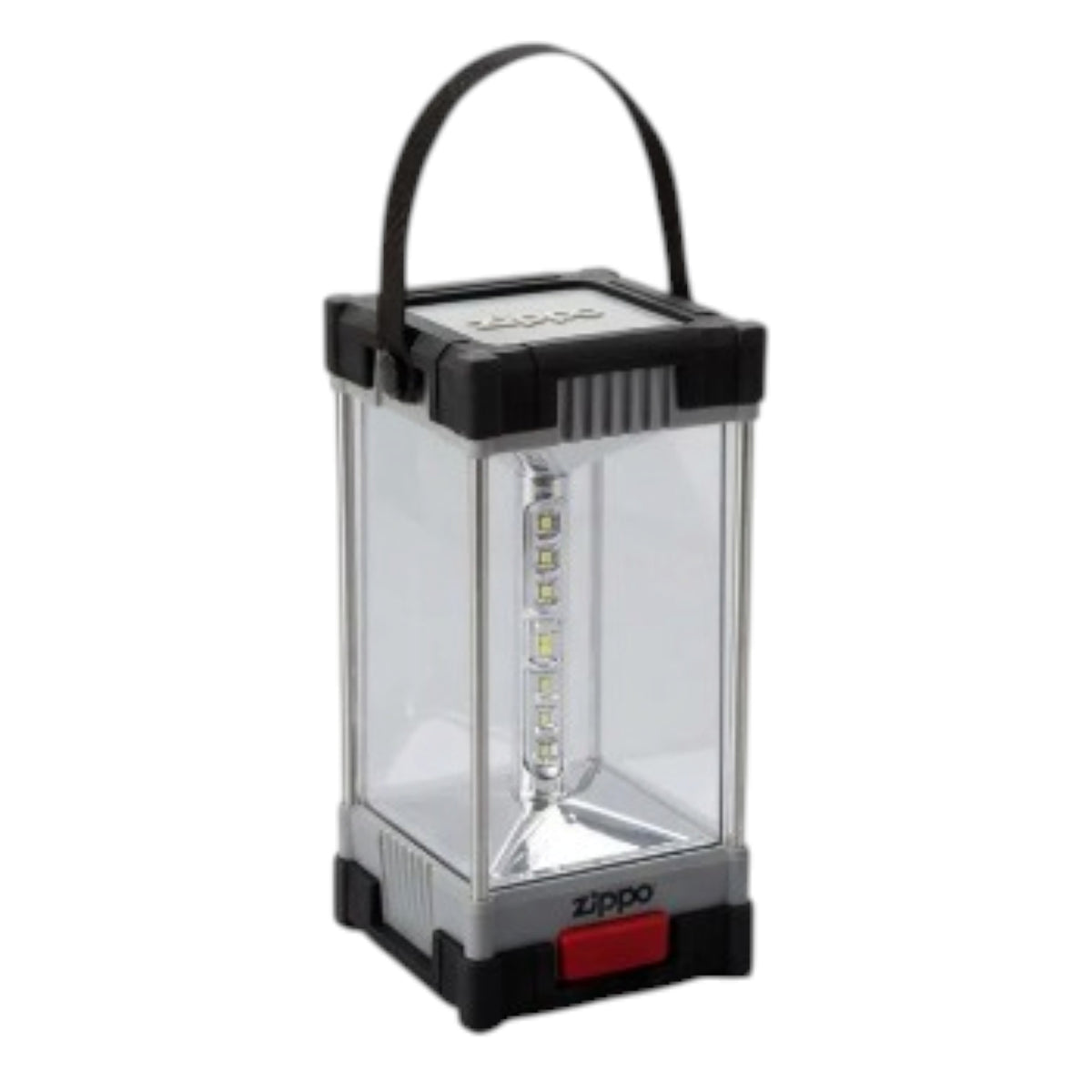 Angled view of a Zippo portable LED lantern featuring a clear rectangular housing, visible vertical strip of LED bulbs, grey frame with black reinforced corners, red power button, black carrying handle, and Zippo branding on the lower front.
