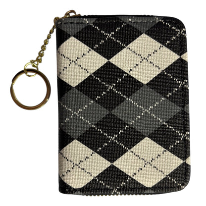 A small zippered card holder or wallet with a black, gray, and cream argyle pattern, featuring a gold-tone metal key ring attachment on a white background. The Wee Smoke Shop