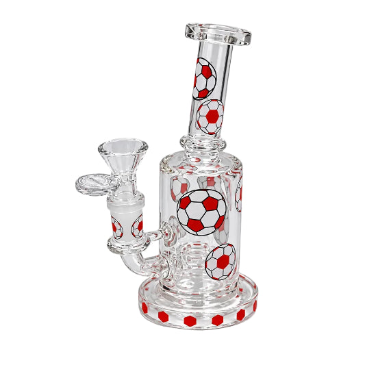 Clear glass water pipe with soccer ball designs on a white background