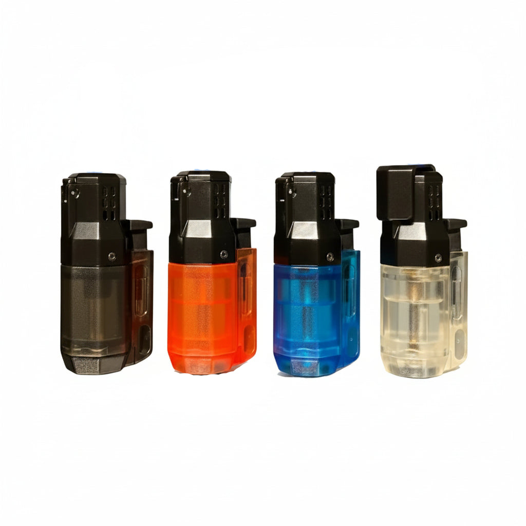 Four translucent lighter-style devices in different colors—black, red, blue, and clear—are lined up on a reflective surface against a textured gray background.