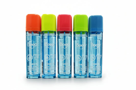 Five Beep brand personal safety spray bottles lined up side-by-side on a white background, featuring different colored caps: orange, lime green, red, green, and blue.
