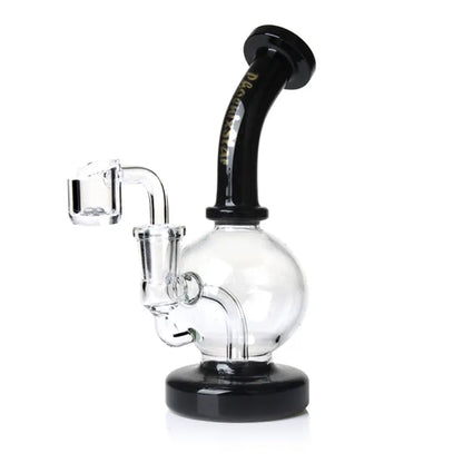 Glass smoking dab rig with black accent on a white background
