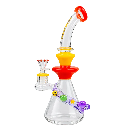 Colorful glass smoking device with smiley face designs on a white background