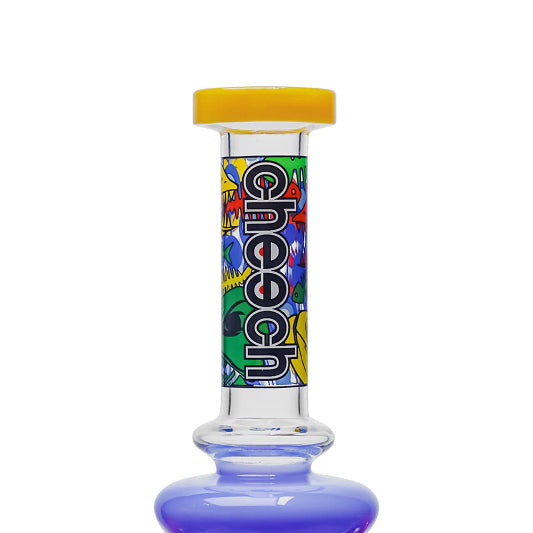 Glass smoking accessory with colorful label and yellow cap on a white background