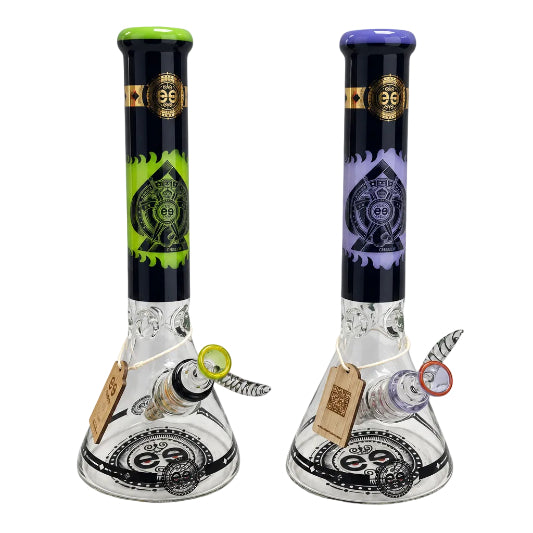 This image features two Cheech 14" Protest the Crest Bongs, each uniquely adorned with vibrant, psychedelic designs. On display are the bongs in both purple with green accents and blue with yellow accents, showcasing a mix of colors that enhance their visual appeal.