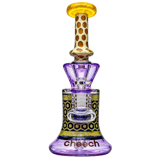 Glass smoking device with purple base and yellow top on a white background