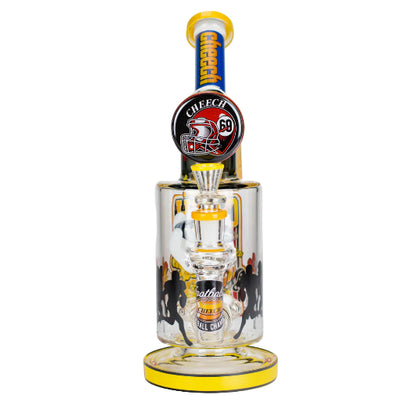 Clear glass bong with colorful labels and a yellow base on a white background