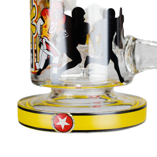 Clear glass smoking accessory with colorful design and silhouette figures on a white background