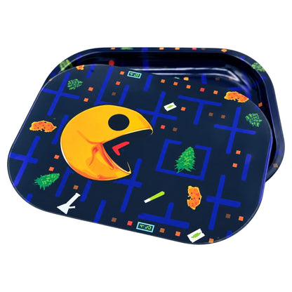 Angled view of the Smoke Arsenal Dankman magnetic rolling tray cover with rounded corners, yellow arcade character, blue maze pathways, green cannabis graphics, and colourful retro gaming artwork on a white background.