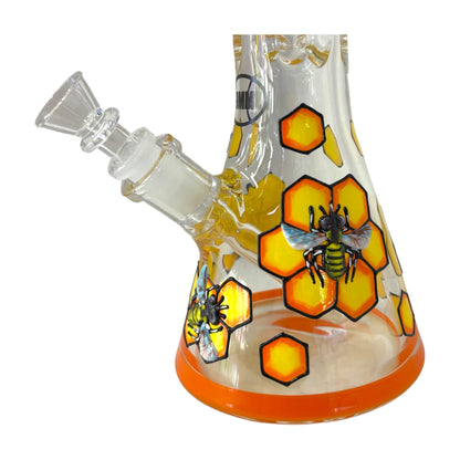 Close-up of the 9mm glass beaker bong base with bee artwork, honeycomb graphics, orange rim, glass bowl, and downstem. - The Wee Smoke Shop
