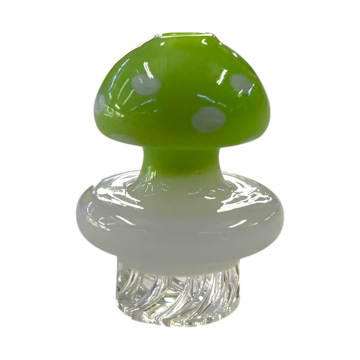Green mushroom dab carb cap with white spots, glossy glass finish, and clear textured base. - The Wee Smoke Shop