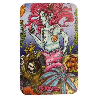 G-Rollz metal storage tin lid featuring a turquoise-skinned mermaid with flowing pink hair, surrounded by underwater plants, sea creatures, and colourful fantasy artwork.