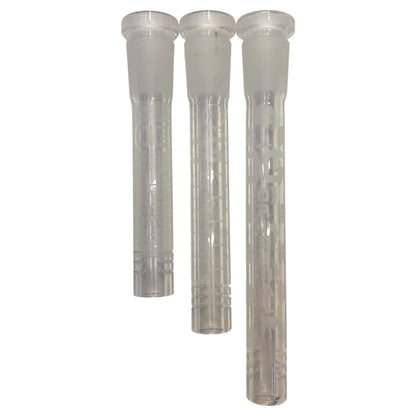 Three clear OG glass downstems in assorted lengths, featuring frosted glass joints, etched Prism, Honeycomb, and Clover patterns, and slotted diffuser ends on a white background. 