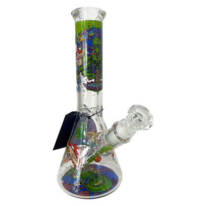 Angled view of Phoenix Star glass beaker bong featuring alien, mushroom, and planet graphics with clear glass bowl and downstem. - The Wee Smoke Shop