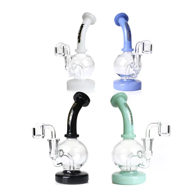 Four glass dab rigs with different colored bowls on a white background