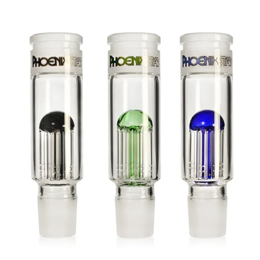 Three glass smoking accessories with colored tops on a white background
