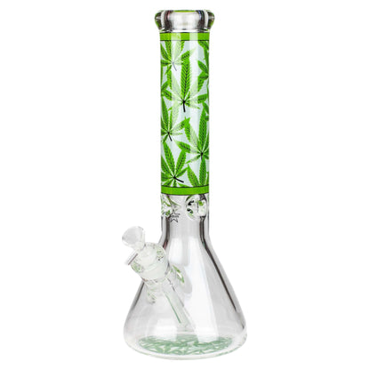 Glass water pipe with cannabis leaf design on a white background