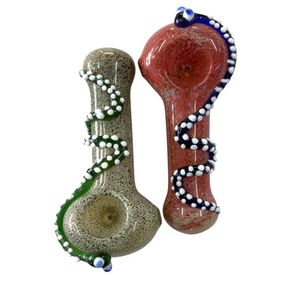 Two 4-inch glass hand pipes side by side, one red and one green, both with raised spiral wrap and white bead accents. - The Wee Smoke Shop
