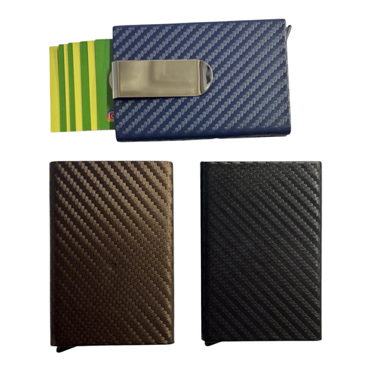 Three slim carbon-fiber-texture wallet or card holder cases shown on a white background: one blue case at the top with a metal clip and cards partially visible, plus two closed cases below in brown and black. - The Wee Smoke Shop