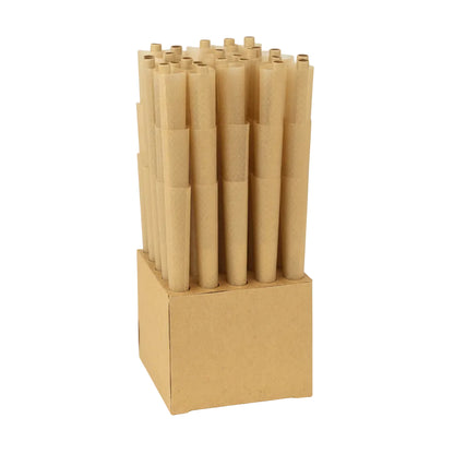Set of brown raw cones in a cardboard holder on a white background