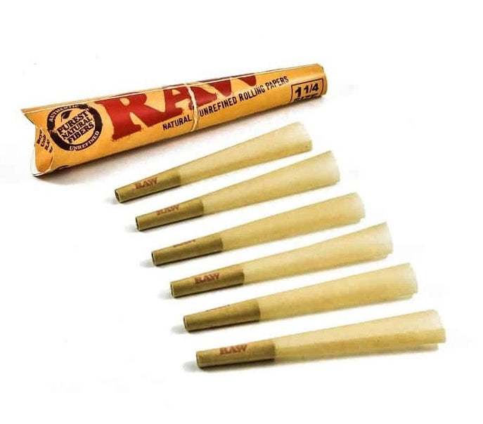 Raw rolling paper cones with packaging on a white background