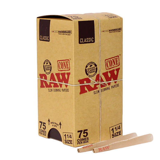 Box of Raw smoking cones with two cones in front on a white background