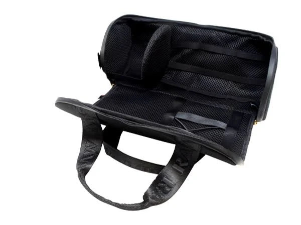 Black travel bag with mesh compartments on a white background