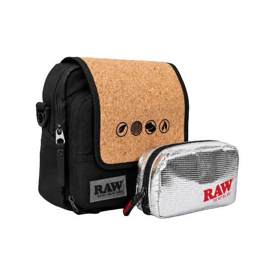A black and brown RAW x Rolling Papers Day Bag with a cork top and a foil-sealed bag-in-a-bag, featuring Velcro-swappable patches and multiple compartments.