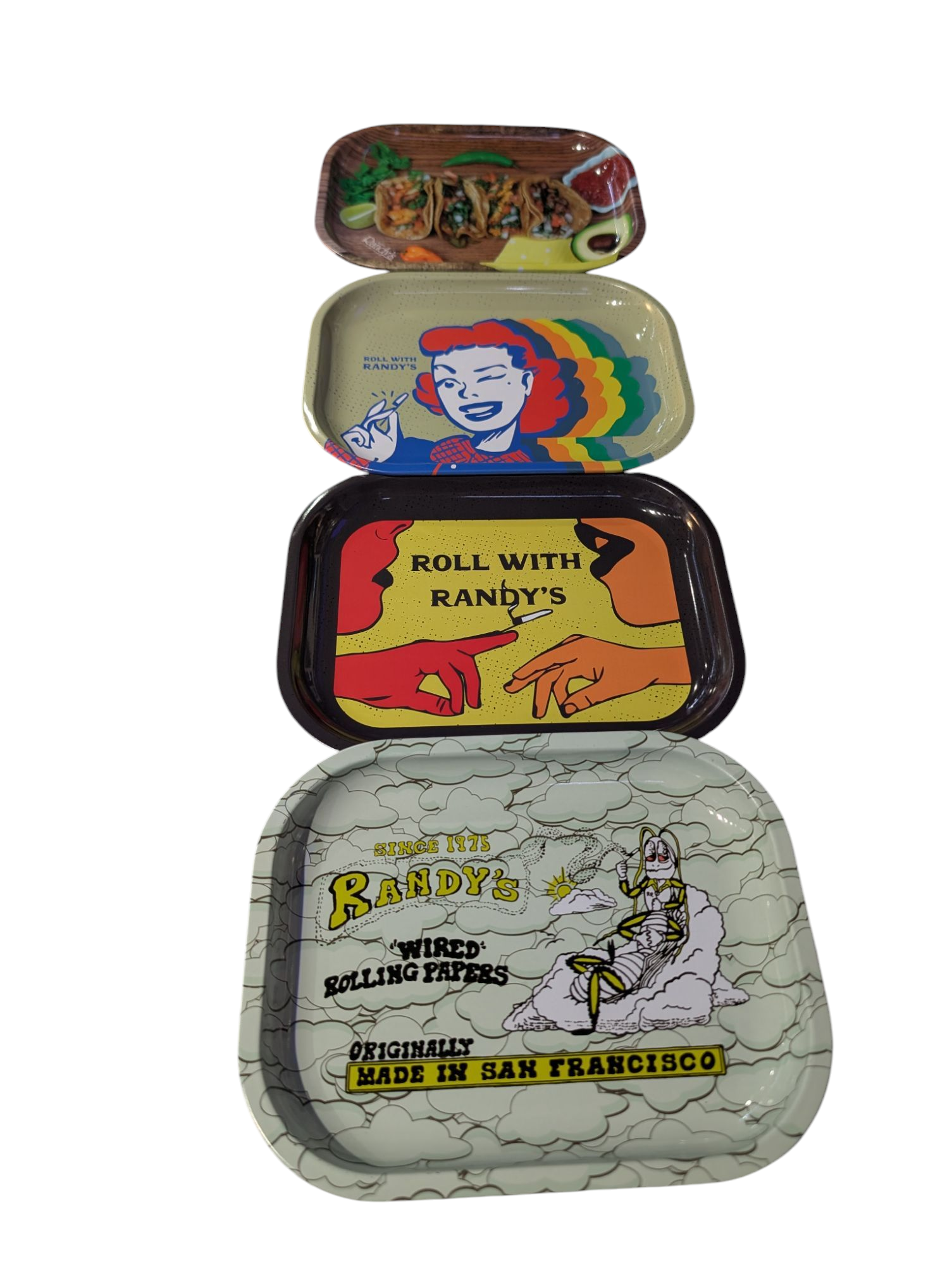 A set of four vintage-style metal rolling trays with various designs, labeled with 'Randy's Rolling Tray' and phrases like 'Roll with Randy's' and 'The World's #1 Rolling Tray Program Made in San Francisco'.