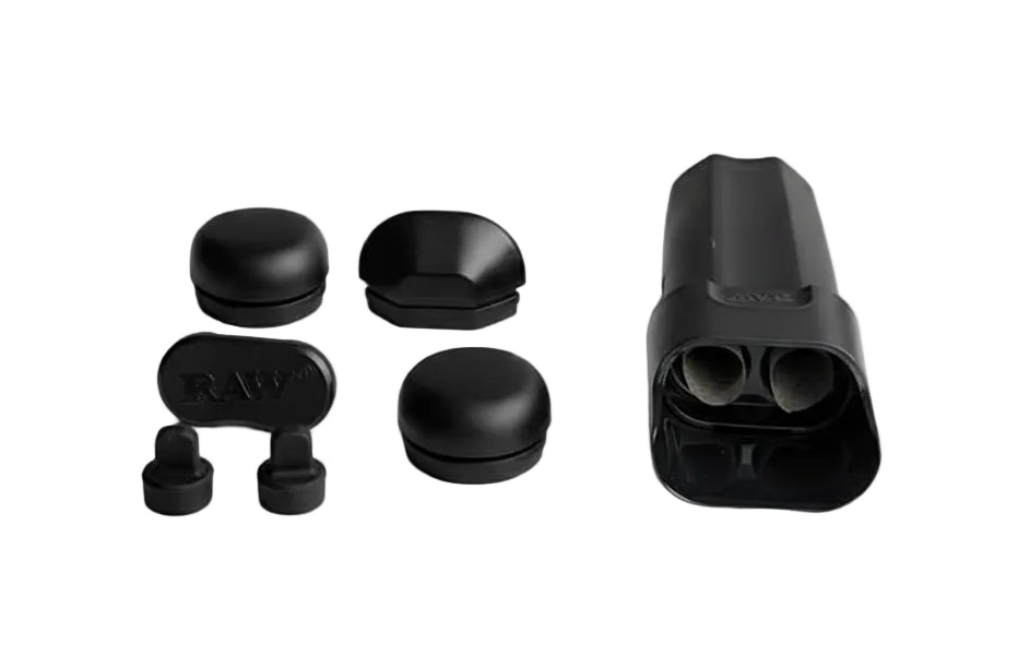 Black RAW smoking accessories including a large container, cap, and small components on a white background.
