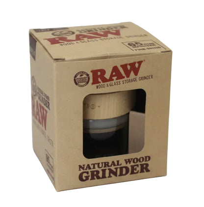RAW natural wood grinder in a cardboard box on a white background