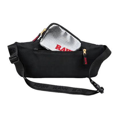 RAW Smell Proof Sling Pack with multiple compartments and zipper closures, predominantly black with some text and logo detailing.