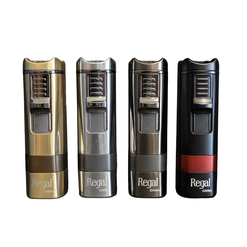 Four Regal cigar torch lighters in different finishes (gold, silver, stainless steel, and black with a red accent band) lined up side-by-side on a white background.