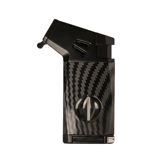 A carbon fiber lighter with a black top and a textured black-and-gray carbon fiber body, featuring a circular silver control knob on the front.