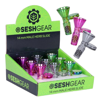 SeshGear 14mm male herb slide display box with assorted chromatic glass funnel bowls in green, pink, grey, clear, and iridescent finishes, with SeshGear branding and “14 mm Male Herb Slide” text visible. - The Wee Smoke Shop