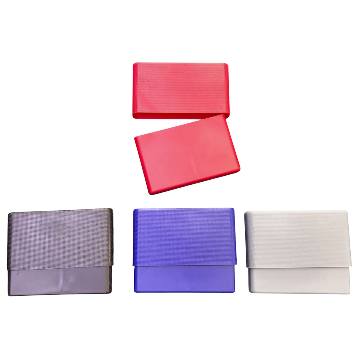 Assorted slide-top cigarette cases shown in grey, blue, white, and red, with one red case opened to show the removable sliding top.