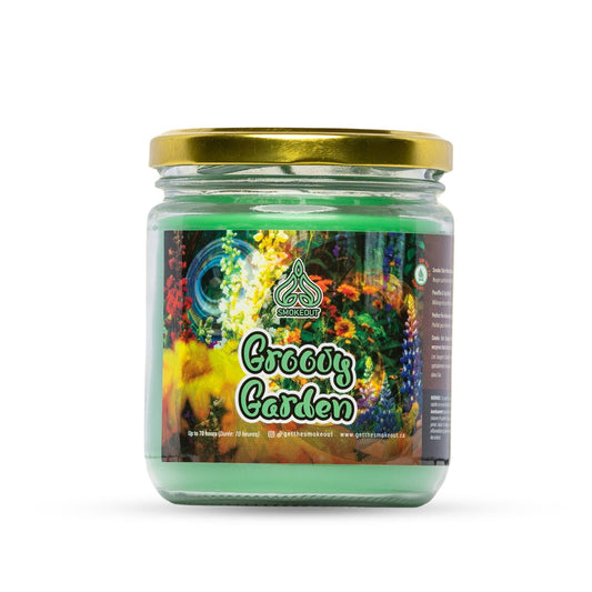 SmokeOut Groovy Garden 13oz odour-neutralizing candle in glass jar with gold lid and floral label. - The Wee Smoke Shop