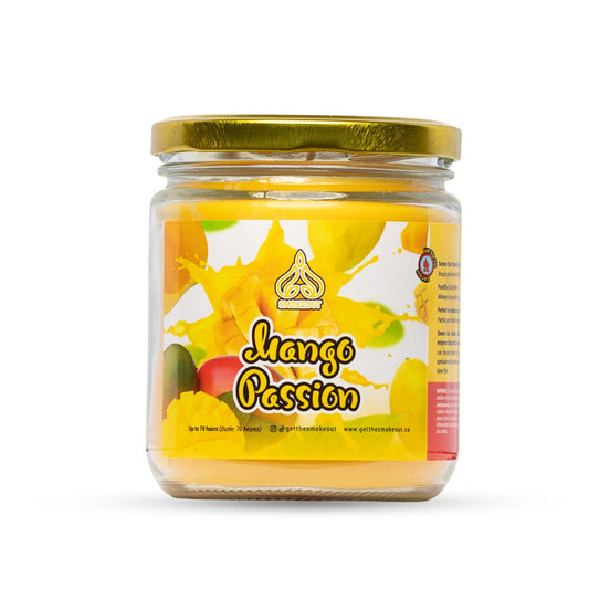 SmokeOut Mango Passion 13oz odour-neutralizing candle in glass jar with gold lid and mango label. The Wee Smoke Shop