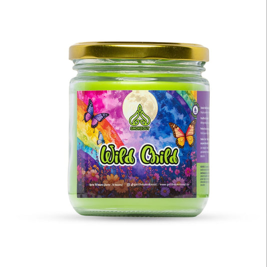SmokeOut Wild Child 13oz odour-neutralizing candle in glass jar with gold lid and rainbow butterfly label. - The Wee Smoke Shop