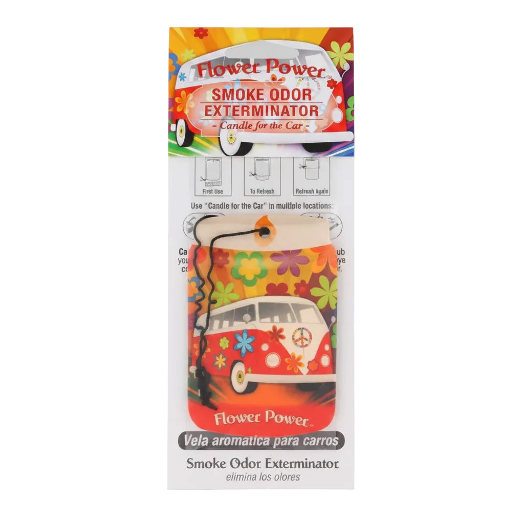 Flower Power Smoke Odor Exterminator candle for cars, featuring a retro VW bus design with a colorful peace sign and flower pattern, in its original retail packaging.