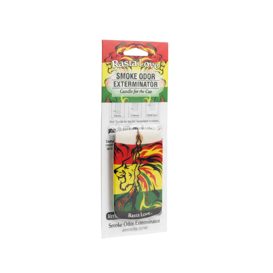 Rasta Love Smoke Odor Exterminator candle for car air freshener, in its original retail blister packaging with a red, yellow, and green Rasta-themed header card and a lion graphic.