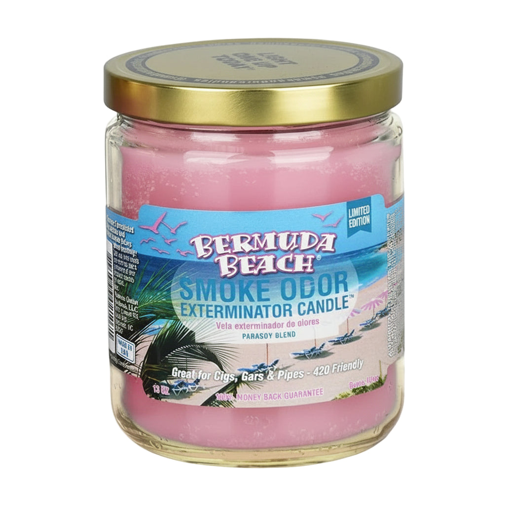 Pink candle in a glass jar with a gold lid, featuring a Bermuda Beach label on a white background. - The Wee Smoke Shop