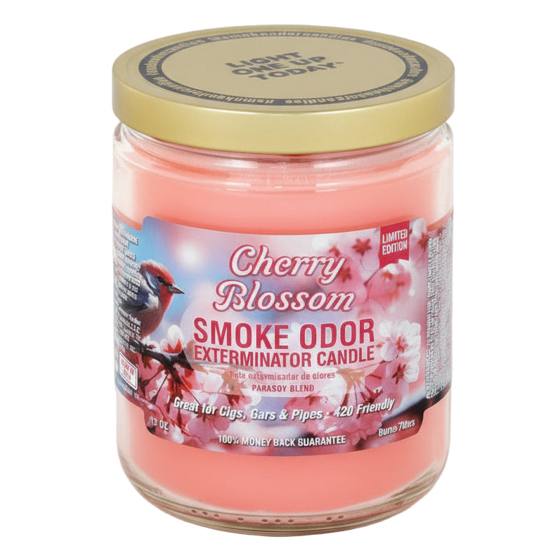 Cherry Blossom Smoke Odor Exterminator Candle with a gold lid on a white background
