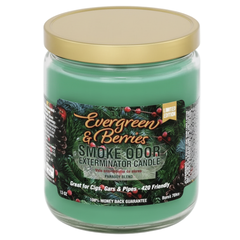 Green candle jar with gold lid labeled 'Evergreen & Berries Smoke Odor Exterminator Candle' on a white background. 