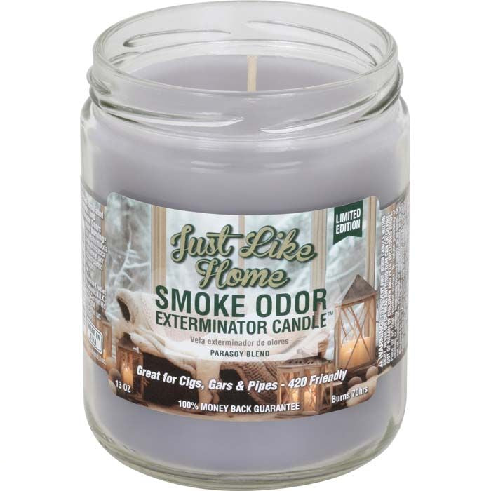 Jar candle labeled 'Just Like Home Smoke Odor Exterminator Candle' on a white background - The Wee Smoke Shop