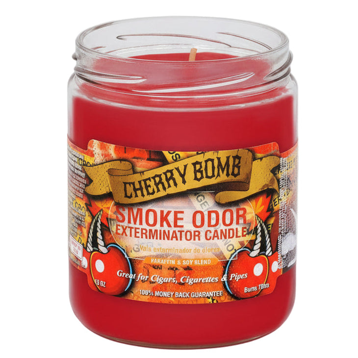 Red candle in a glass jar with a label on a white background The Wee Smoke Shop