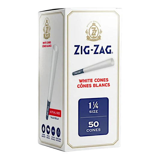 A box of Zig-Zag White Cones (Cónes Blancs) 1 1/4 size, containing 50 cones, shown on a clean white background. The Wee Smoke Shop
